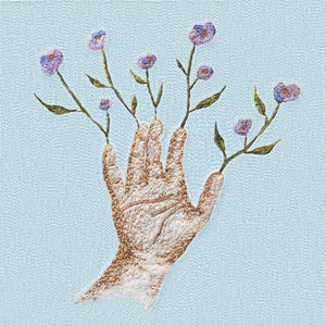 Crocus by The Ophelias on Joyful Noise Recordings (the album artwork is an embroidered image of an open-palmed hand with flowers growing from each of its digits; there is no text or other information on the front cover of the album)