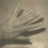 CD edition of Shade by Grouper on Kranky Records (the album artwork is a black and white photograph of a hand; there is no text or other information on the front of the sleeve)