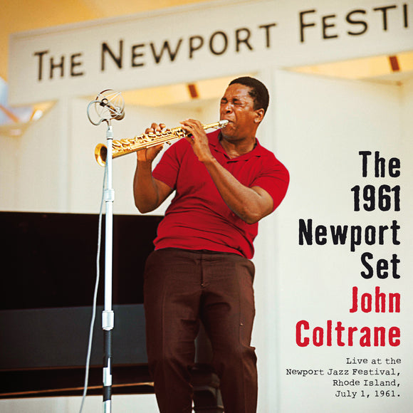 The 1961 Newport Set by John Coltrane on Essential Jazz Classics (the album artwork features a colour photograph of John Coltrane wearing a red polo shirt ad brown slacks while playing an alto saxophone next to a microphone)