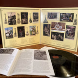 Packshot of The Secret Museum Of Mankind: Guitars Vol.1: Prologue To Modern Styles on Jalopy Records showing the inside of the gatefold album sleeve, the record and inside pages of the booklet