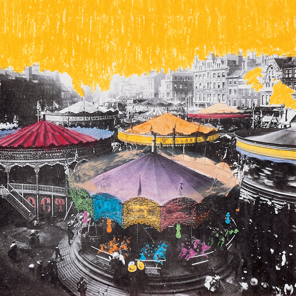 Deluxe edition of On Avery Island by Neutral Milk Hotel on Fire Records (the album artwork is a black-and-white photograph of a fairground that has been partially coloured-in in yellow,, red, blue and green; there is no text or other information on the front of the sleeve)